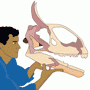 man holding fossil